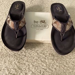 Coach flip flops in brown